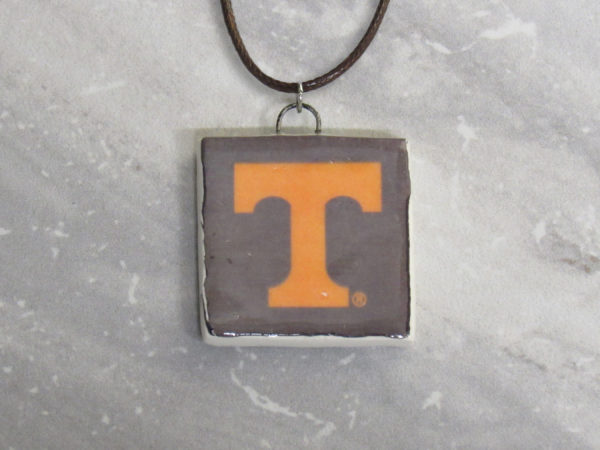 Orange Power T on Dark Gray background - Square Pendant 2700x2025 - on marble - IMG_9097 copy