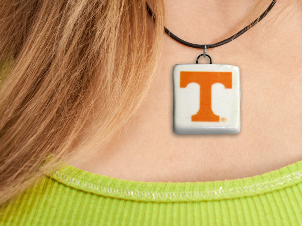 Orange Power t on white square - Necklace mockup copy