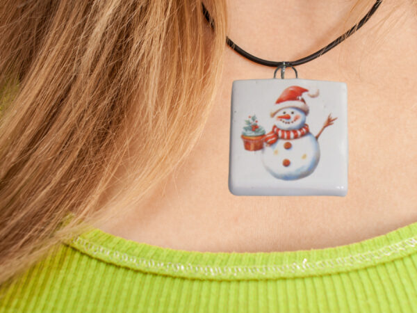 Snowman red hat holding plant - Necklace mockup copy