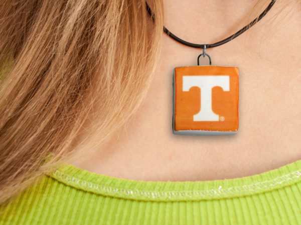 White T on orange square - Necklace mockup copy